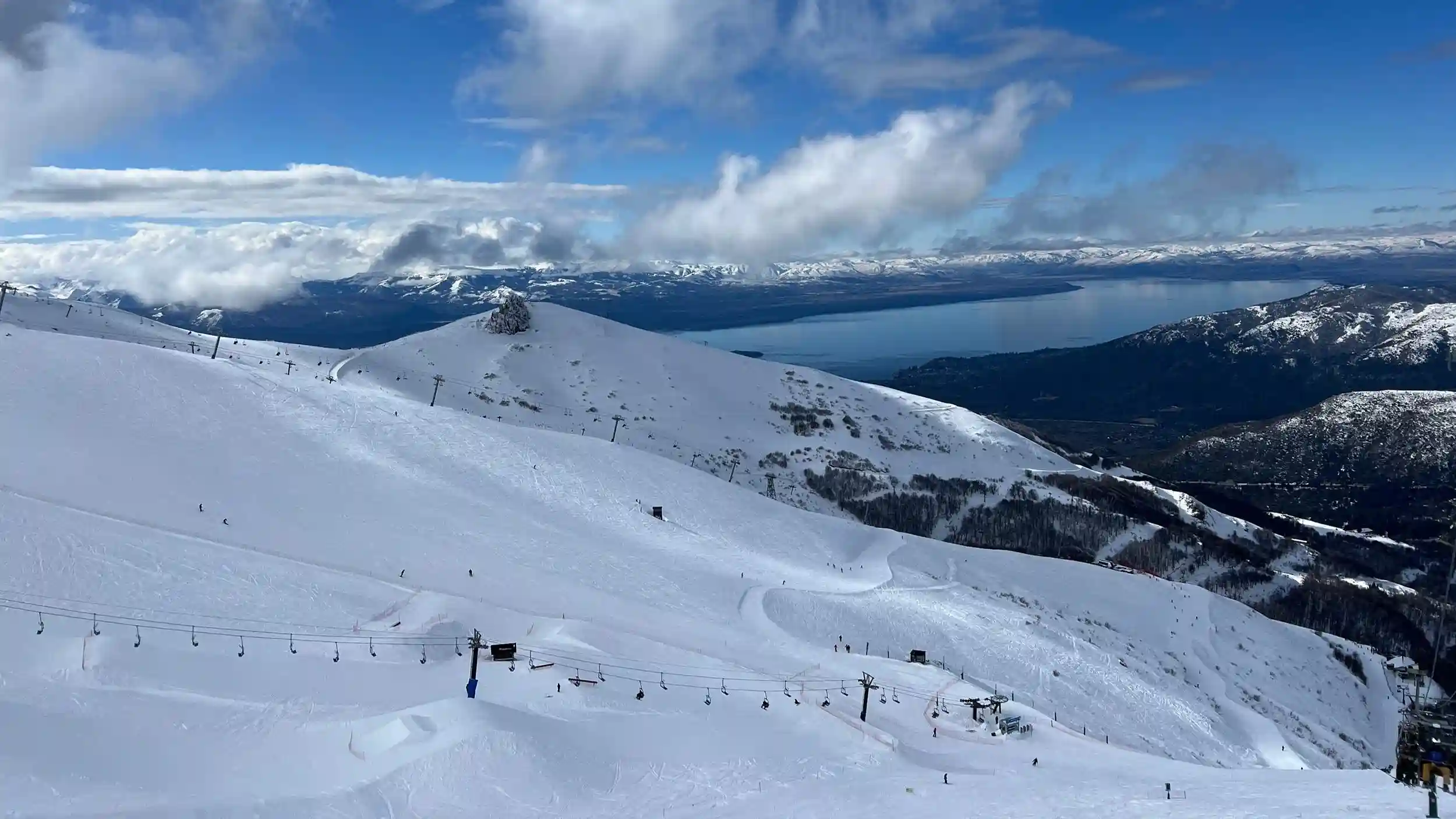 Ski slopes and snowy mountain views at Cerro Catedral ski resort in Bariloche during winter.